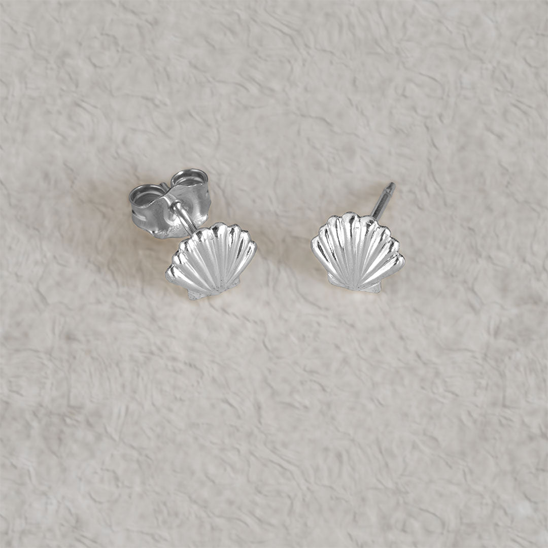 Ariel Shell Stud Earrings Silver Flatlay