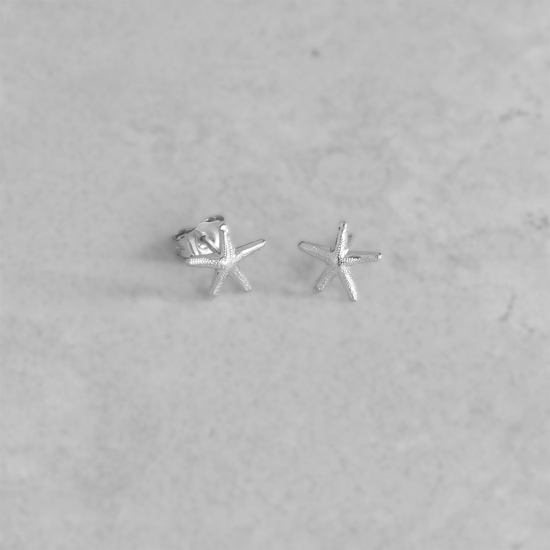 Mermaid Starfish Stud Earrings Silver Flatlay