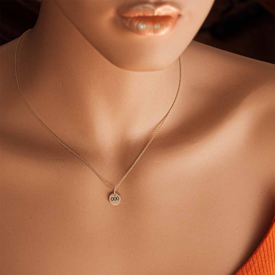 model wearing 000 Angel Number Necklace - Gold