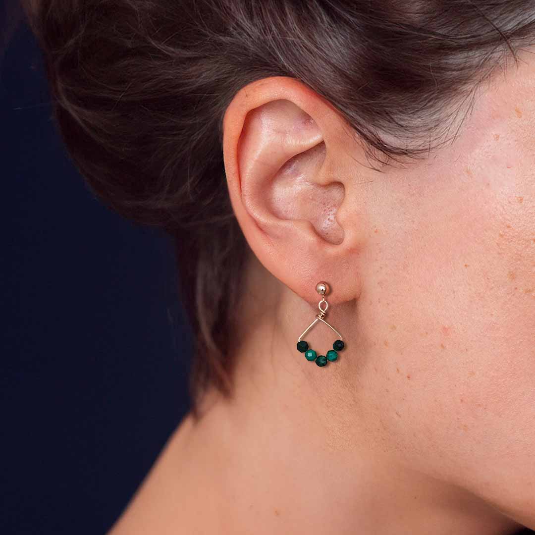 Model wearing Angel 5 Earrings Gold and Malachite