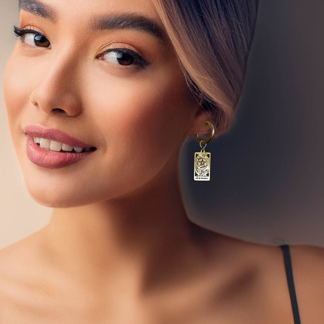 Model wearing Ace of Pentacles Charmed Hoop Tarot Earring Gold