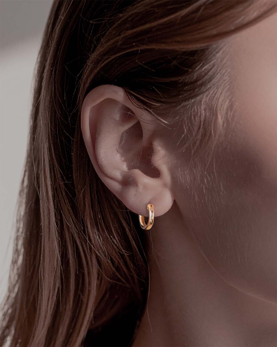 Model wearing Classic Gold Hoop Earrings 13mm - Gold