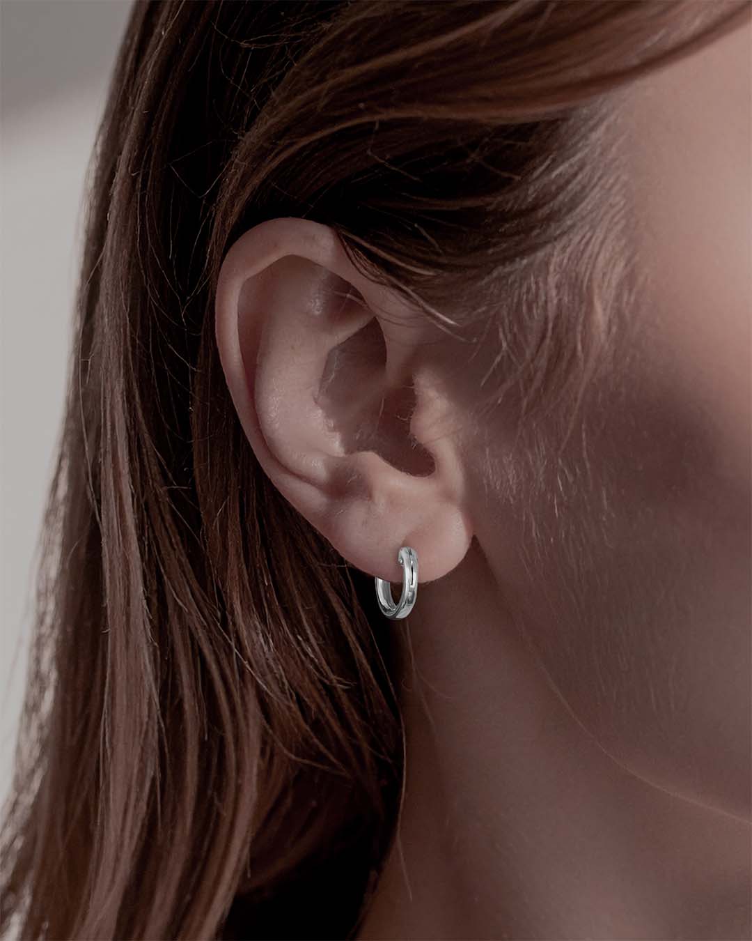 Model wearing Classic Silver Hoop Earrings 13mm - Silver