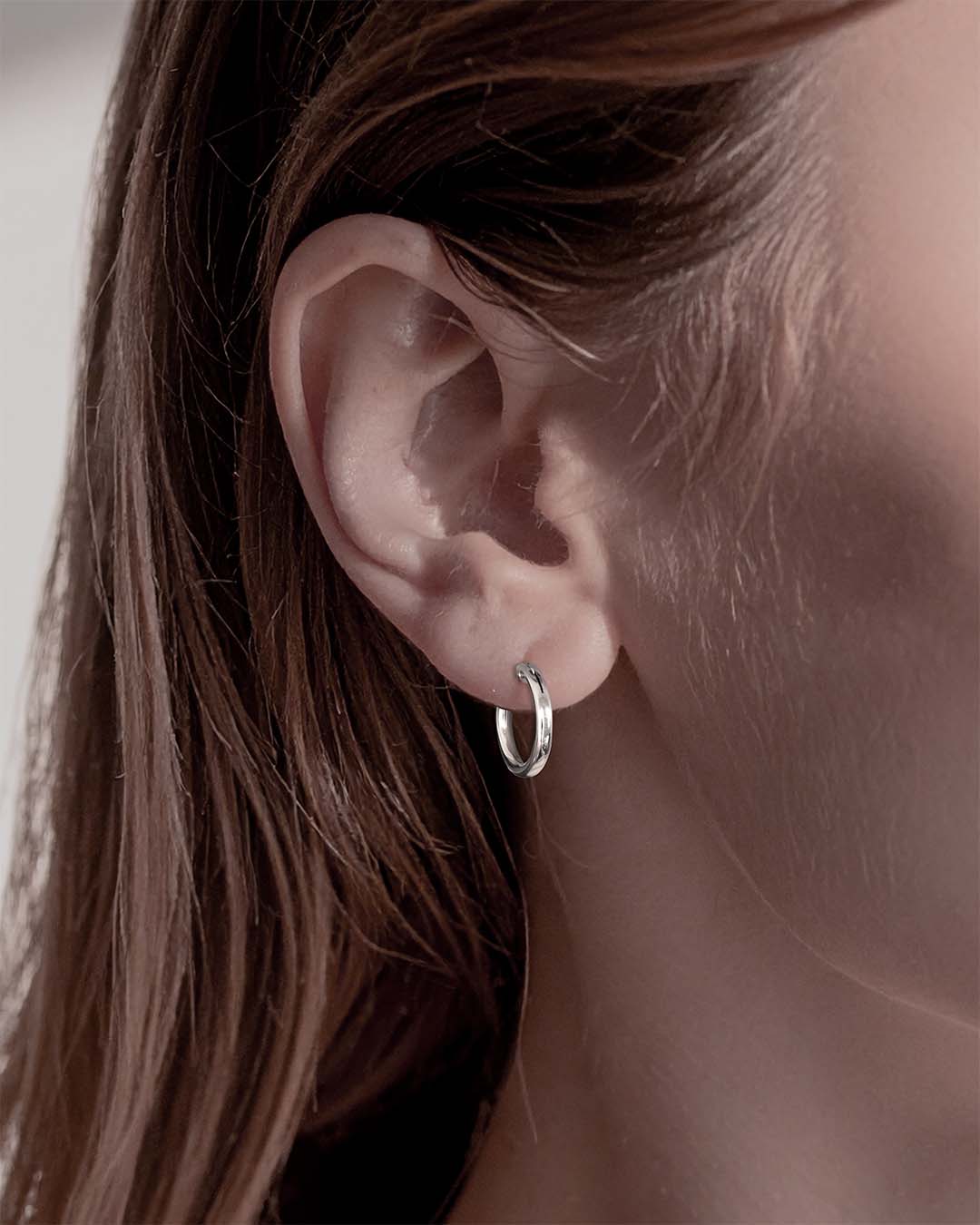Model wearing Classic Silver Hoop Earrings 15mm - Silver