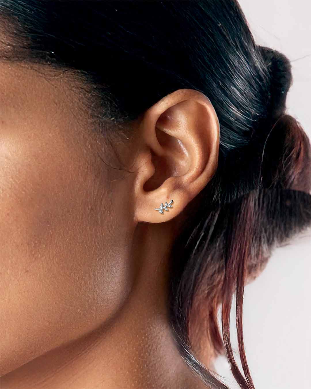 Model wearing Little Leaf Earrings - Silver