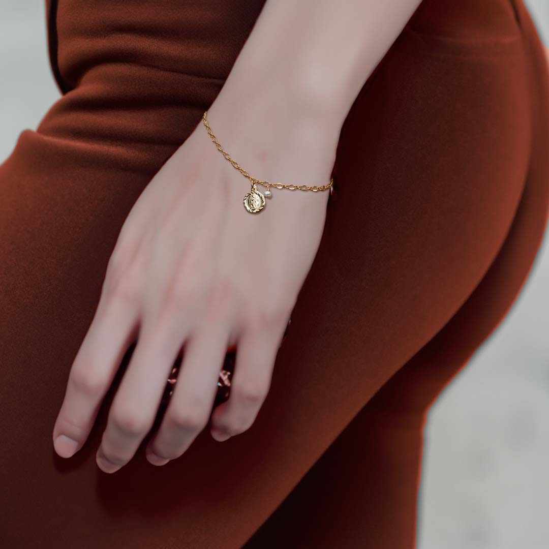 model wearing Impressions Mary Bracelet - Gold and Pearl