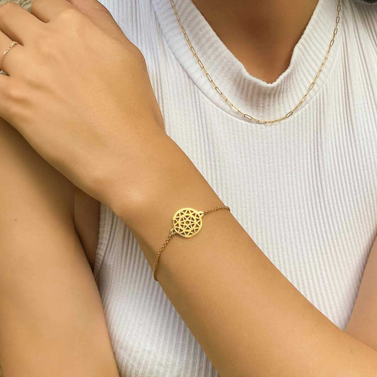 model wearing baby dandlion bracelet gold