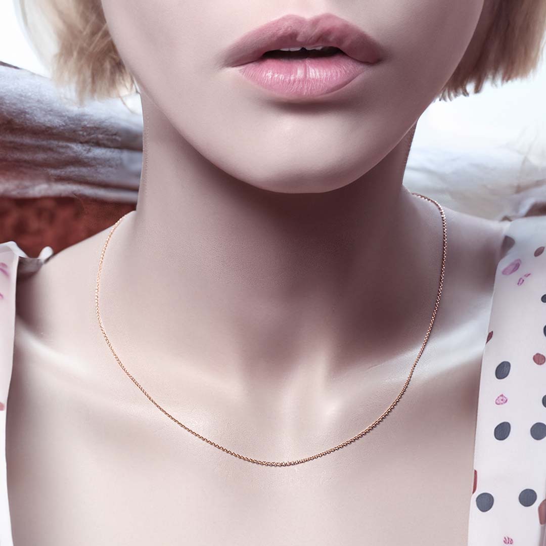 model wearing cable chain necklace gold