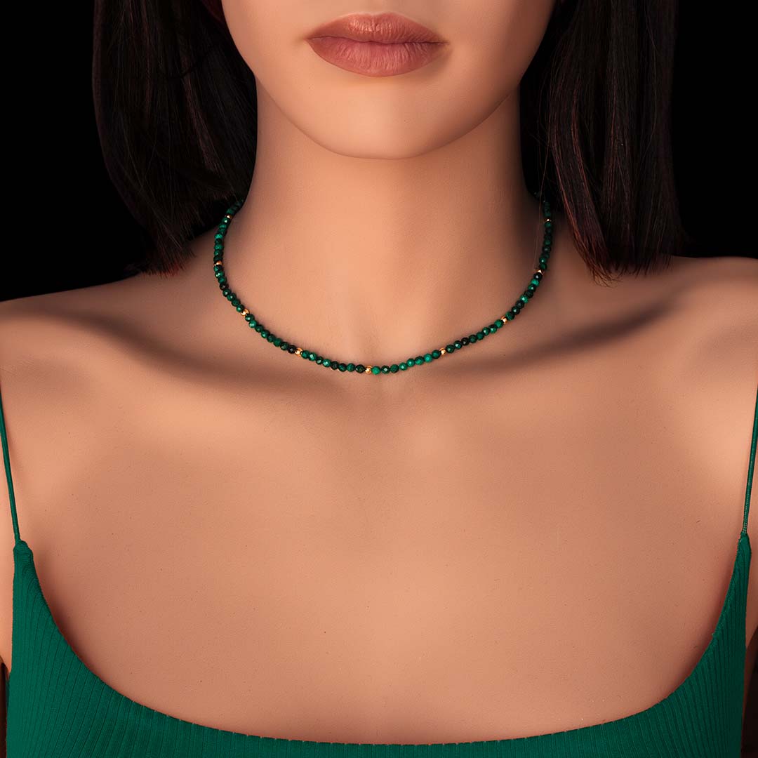 model wearing eve malachite green necklace in gold