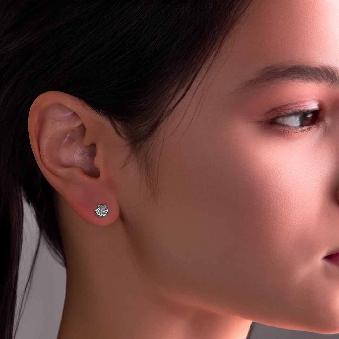 model wearing Ariel Shell Stud Earrings - Silver