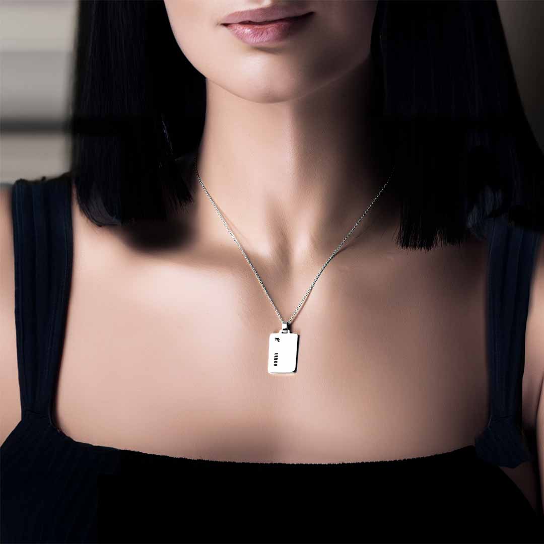 model wearing scorpio star sign necklace silver