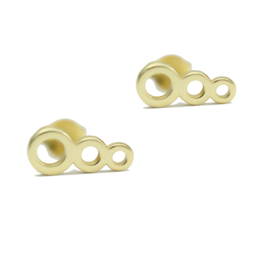 Colliding Suns Earrings Gold sitting