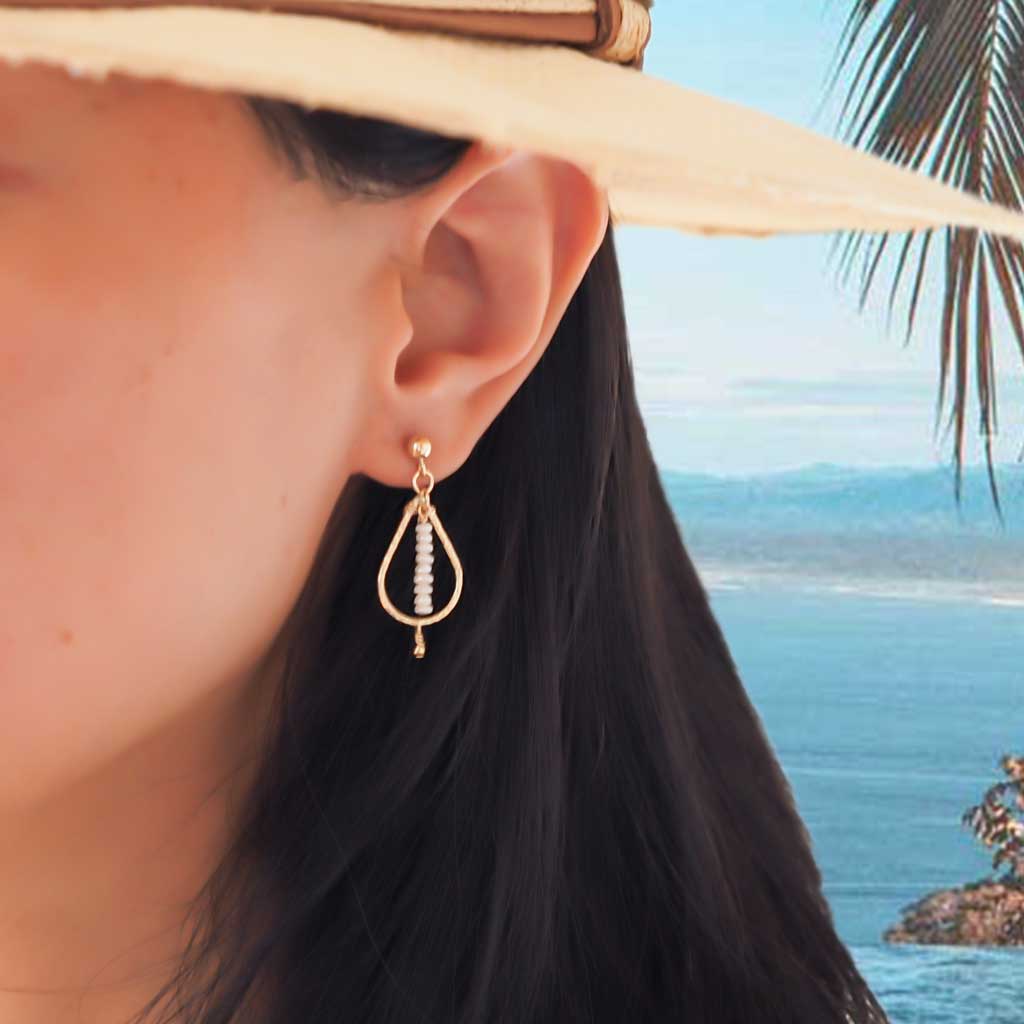 Model-wearing-Candle-Flame-earrings-Gold-and-Pearl