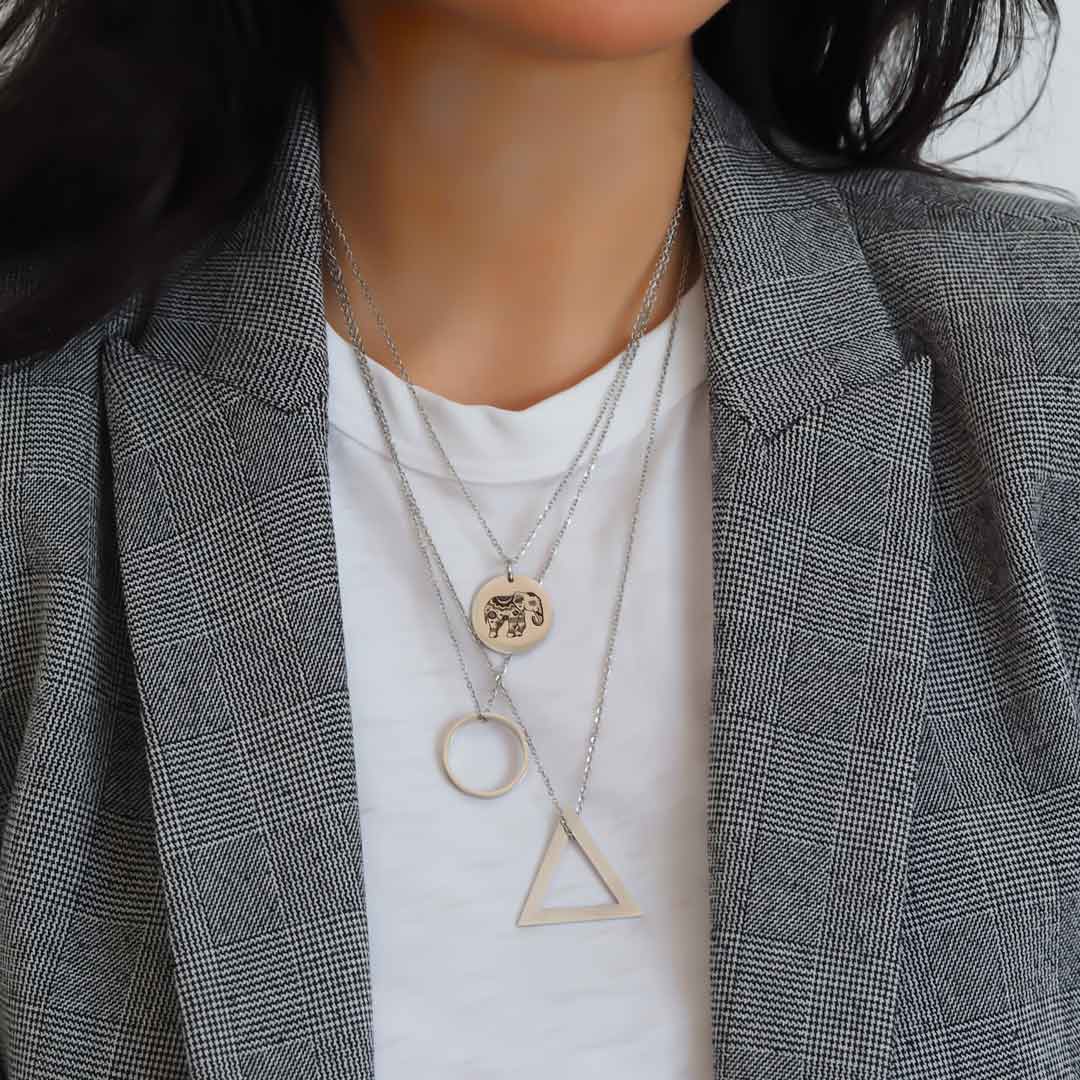 Model wearing elephant, ROF, deltaglyph rhodium short chain