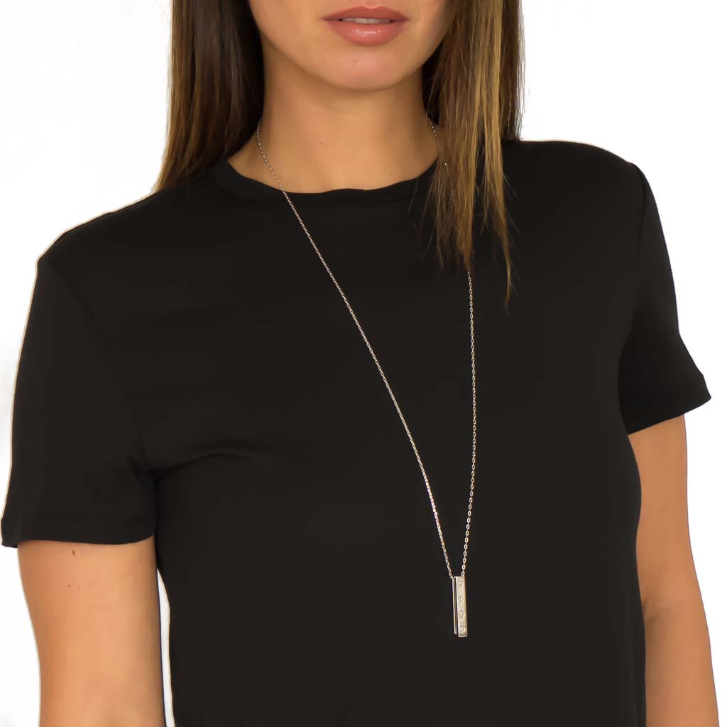 Model wearing Elements Bar Pendant Rhodium