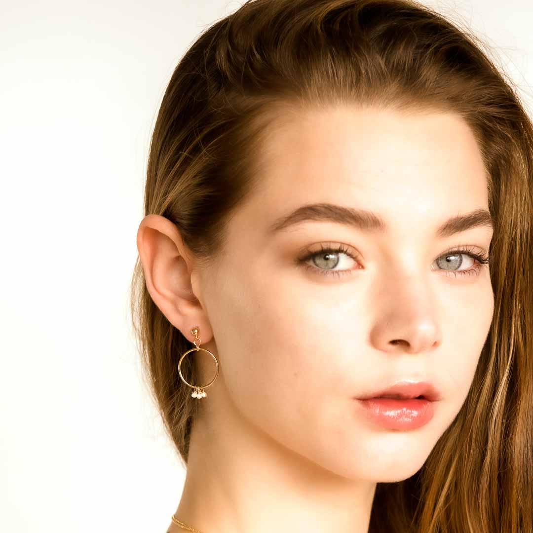 Model wearing Halo Constellation earrings Gold and Pearl-2