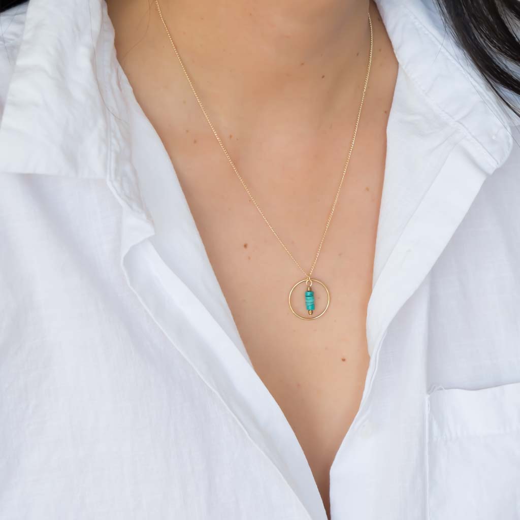 Model wearing Halo Sage Necklace and white shirt