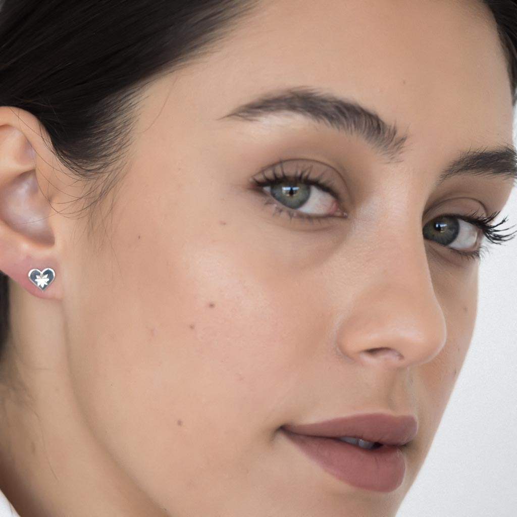 model wearing Dandelion stud earrings sterling silver