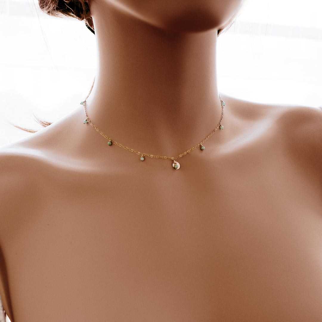 Model wearing Charmed Paige necklace gold amazonite