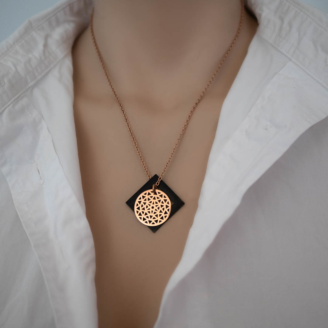 Model wearing Dandelion and Diamond pendant RG black