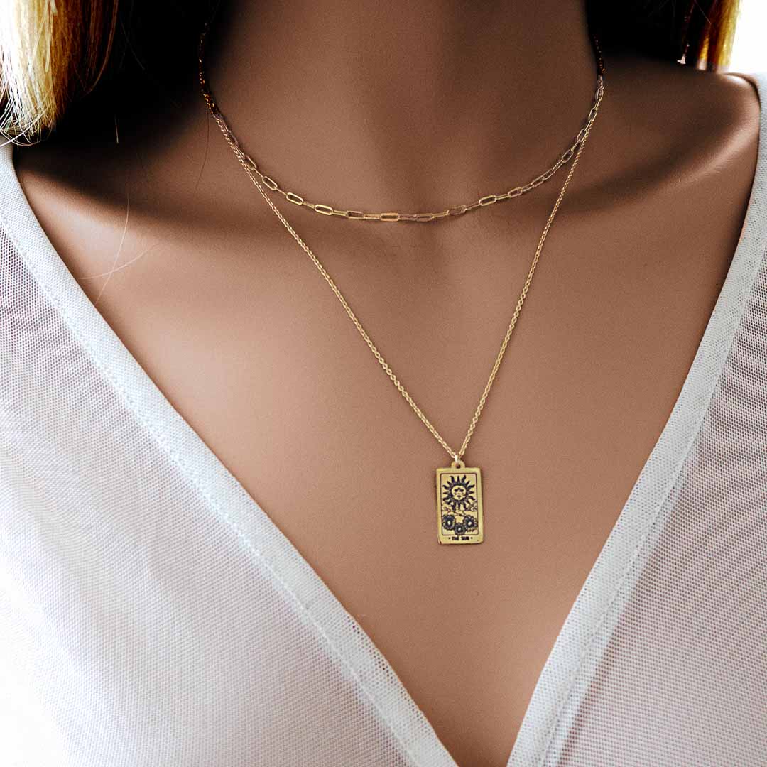 Model wearing Tarot Sun  necklace pendant 14K gold filled jewellery