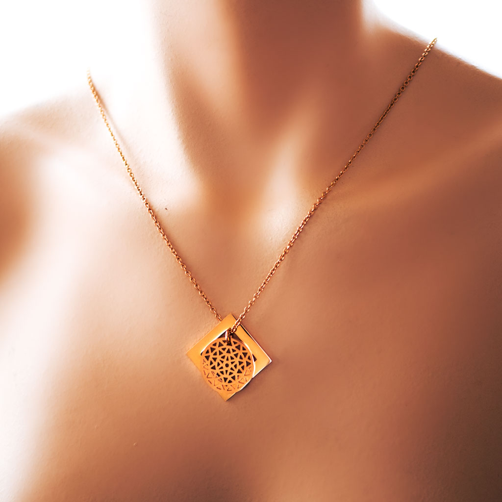 Model wearing dandelion diamond pendant rose gold short chain