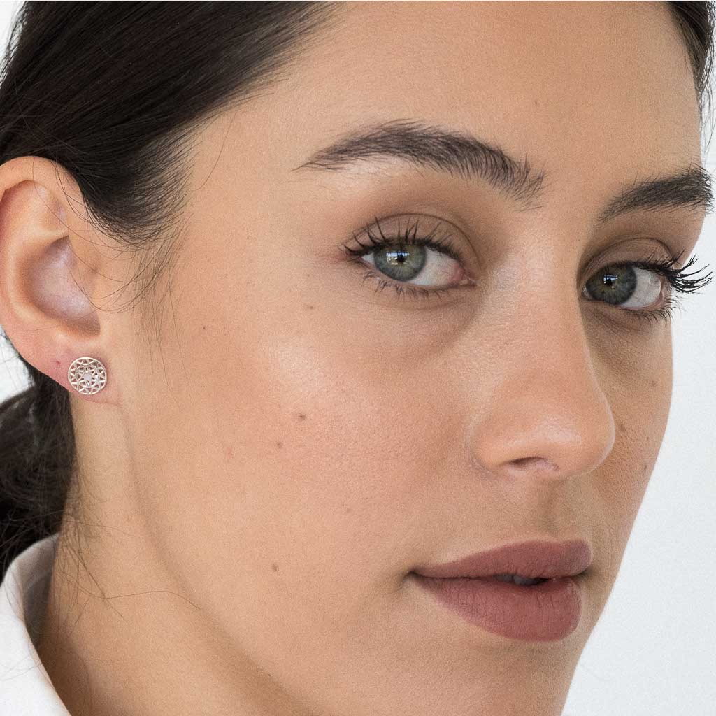 model wearing Dandelion stud earrings sterling silver
