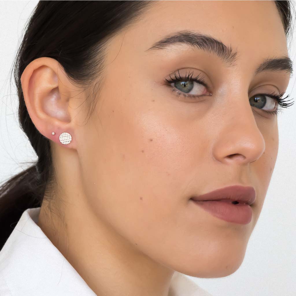 model wearing Rain stud earrings sterling silver