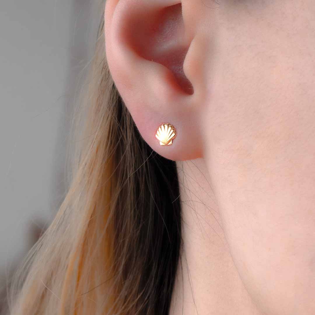 model wearing Ariel Shell Stud Earrings Gold