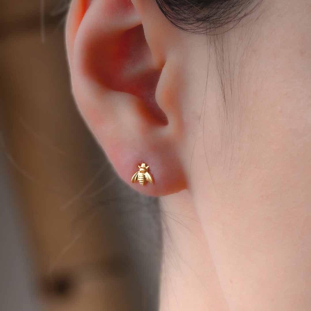 model wearing Honey Bee Stud Earrings Gold