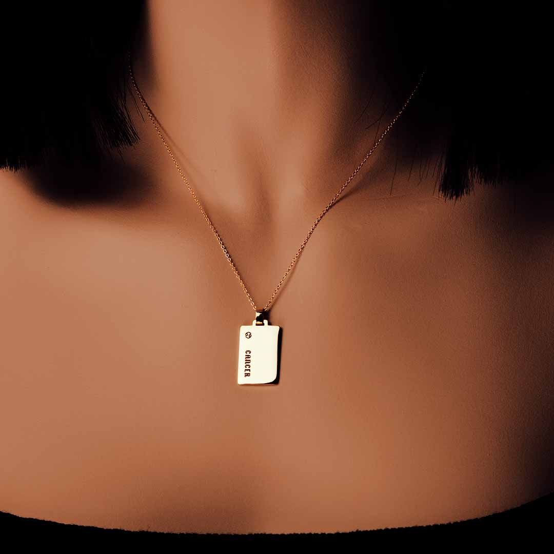 Model wearing Cancer Necklace - Gold