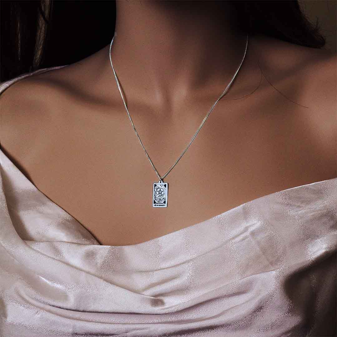 model wearing Tarot Ace Of Pentacles necklace pendant sterling silver jewellery