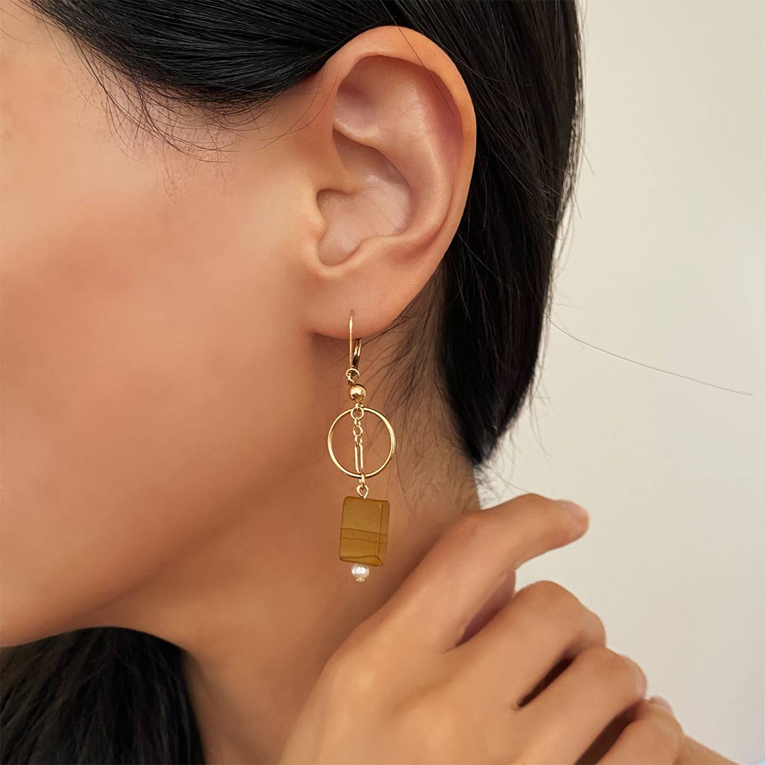 model wearing Toffee Halo Drop Earrings - Gold and Jasper