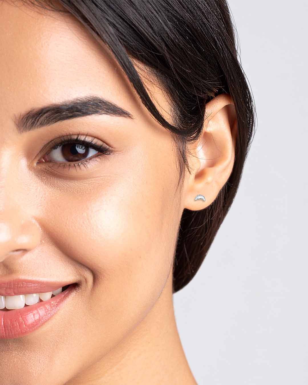 Model wearing Dainty Croissant Stud Earrings - Silver