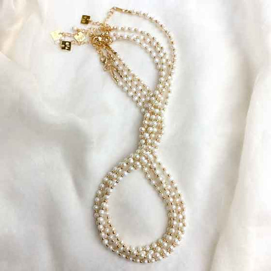 grace necklaces flatlay as icon