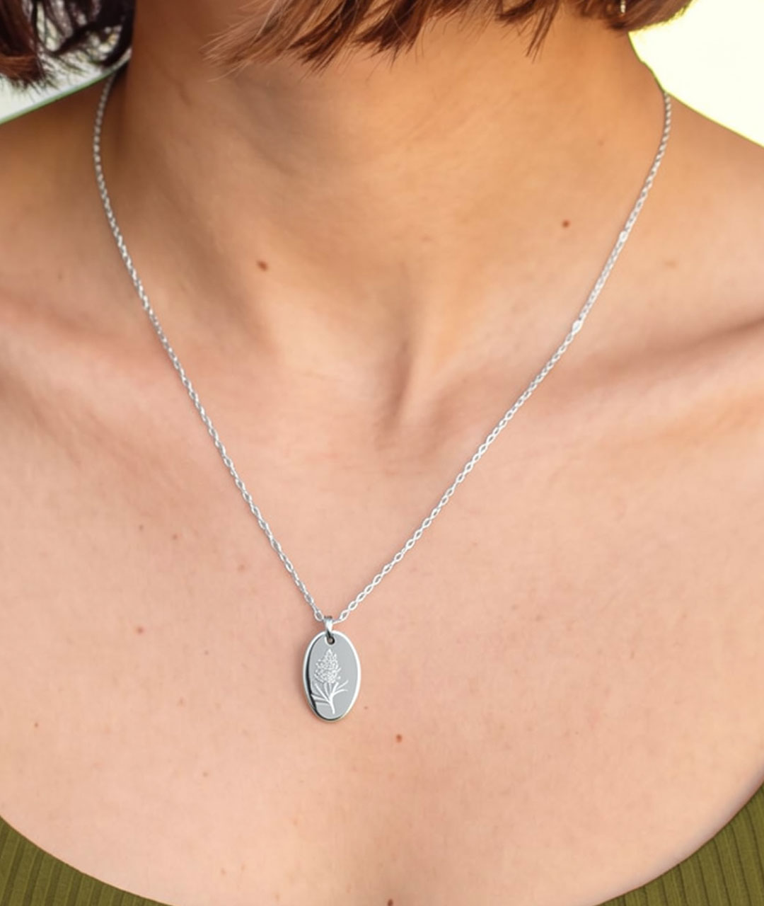 Model wearing Grevillea necklace in silver
