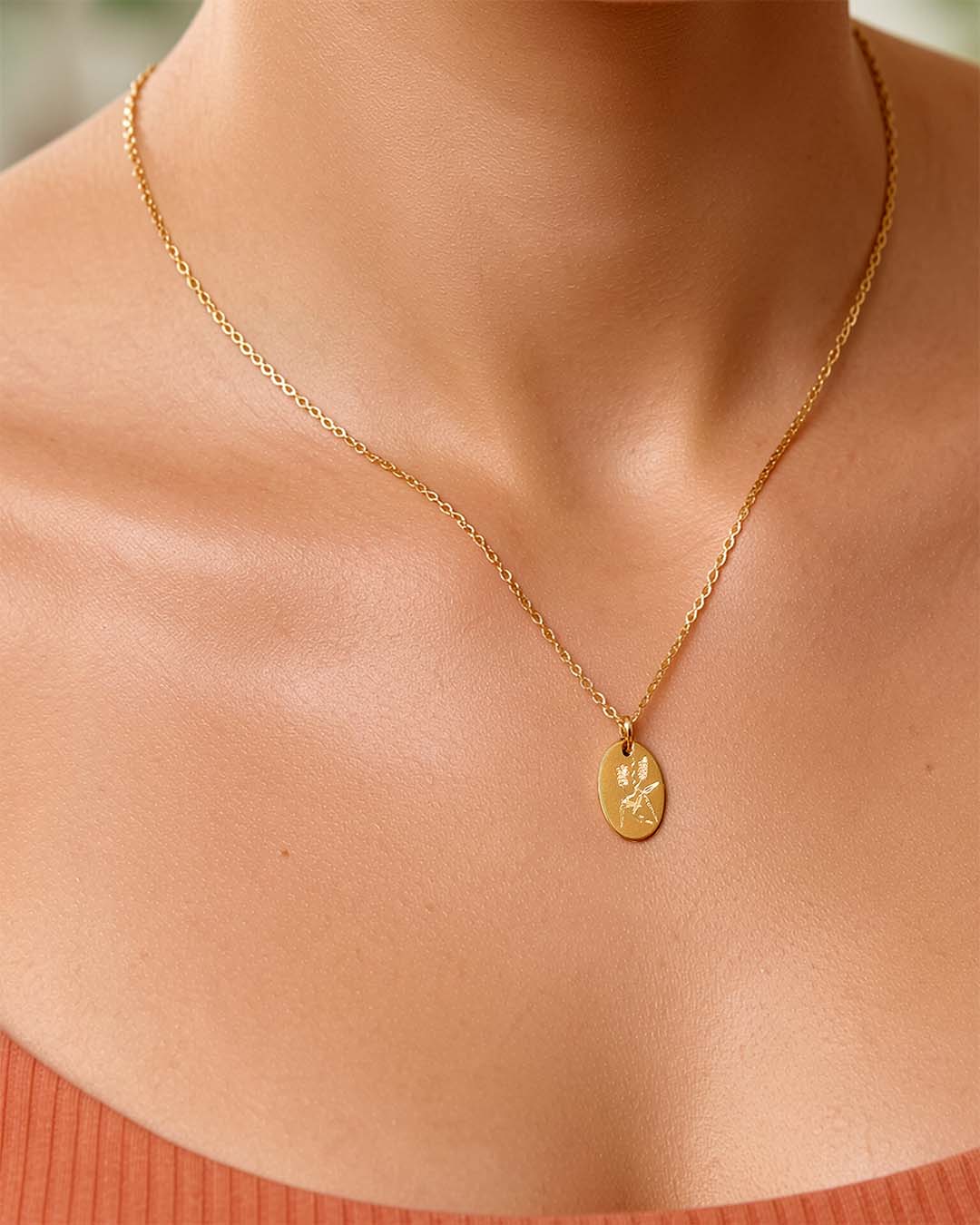 Modle wearing Hardenbergia Necklace - Gold
