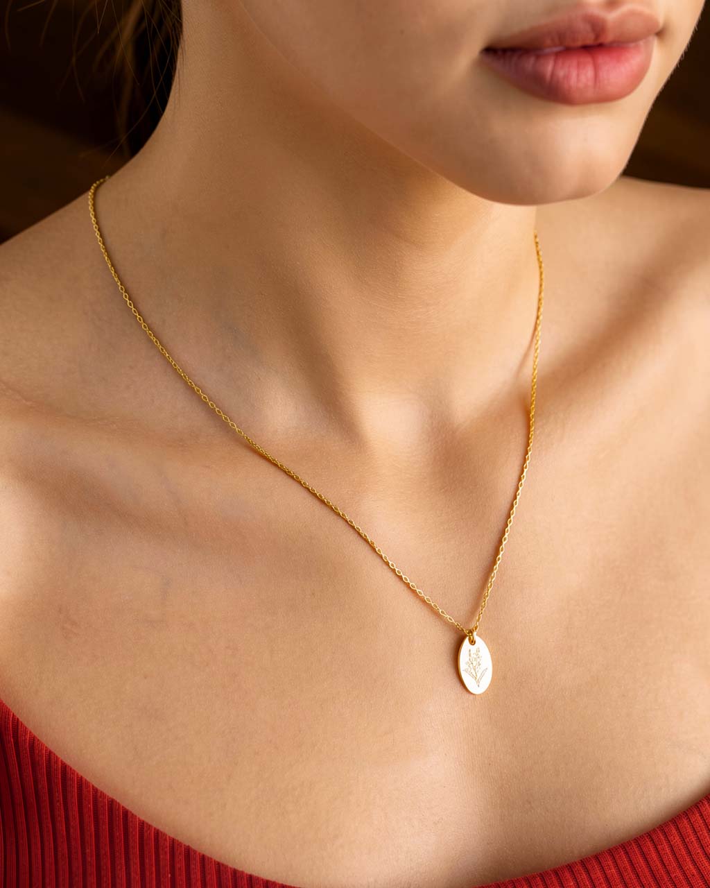 Model wearing Wattle Australian Native Flower necklace Gold