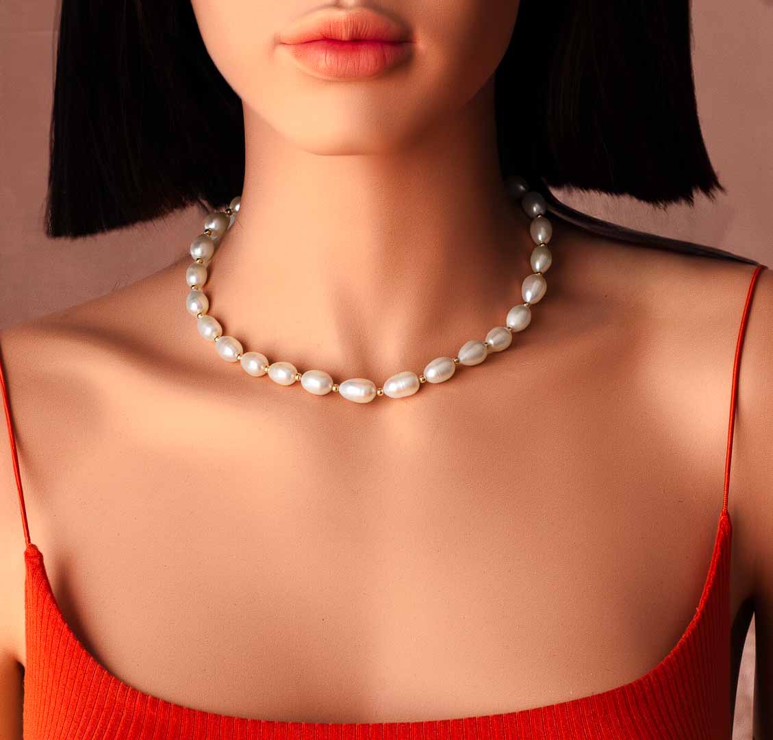 model wearing Audrey Pearl Necklace - Gold and Pearl