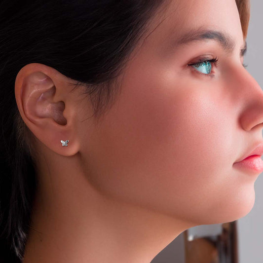 model wearing Butterfly Stud Earrings - Silver