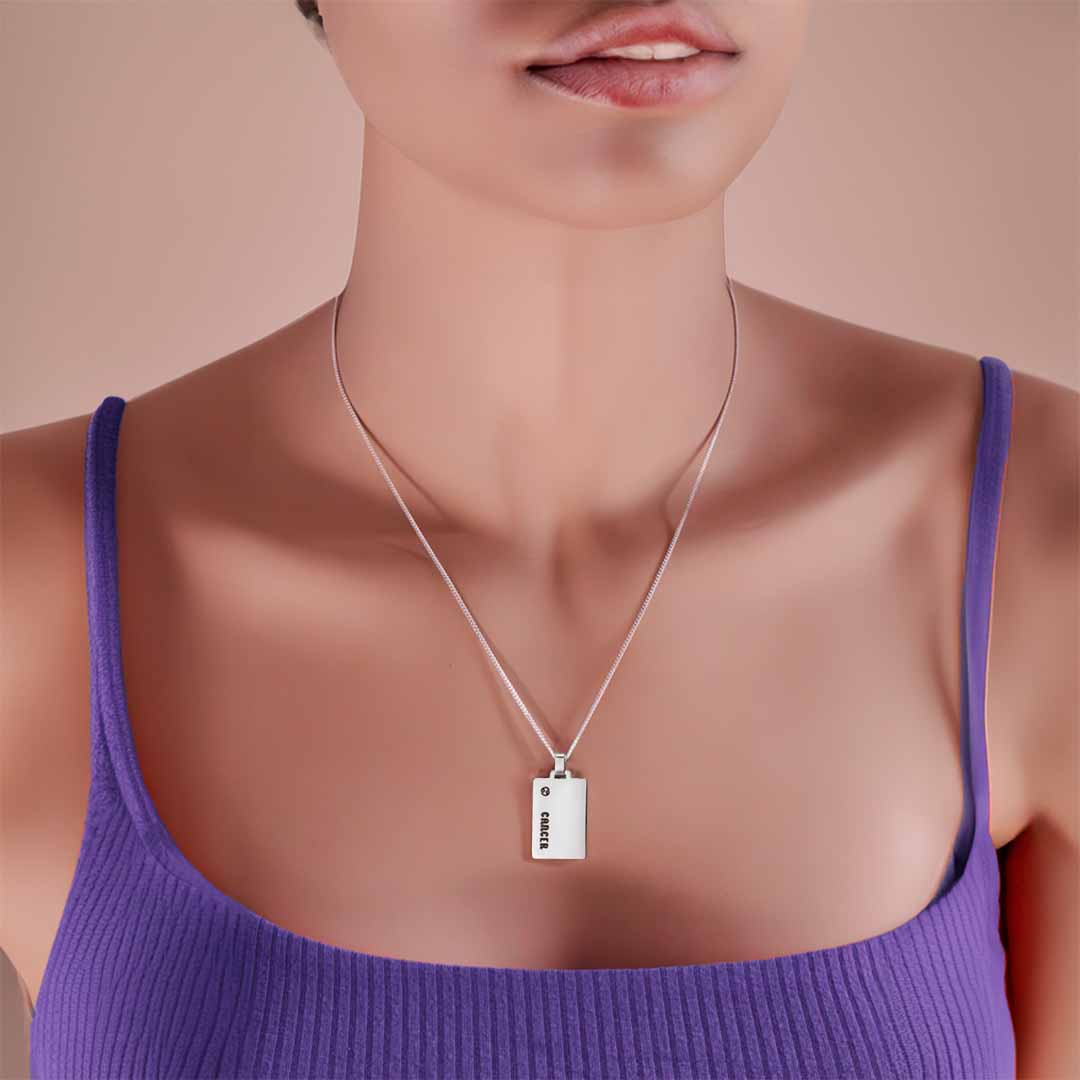model wearing cancer star sign necklace silver