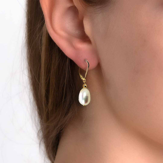 model wearing Enchantment Pearl Earrings - Gold and Pearl