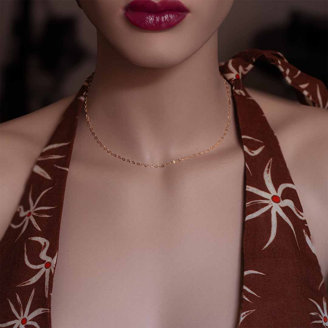 Model wearing Love Link Heart Necklace – Gold