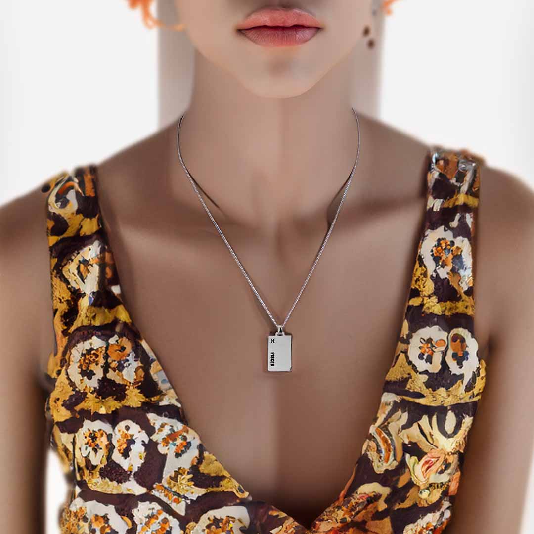 model wearing pisces star sign necklace silver
