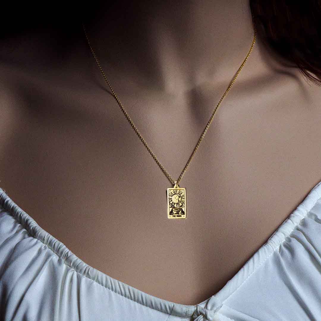model wearing The Moon Tarot Card Necklace - Gold