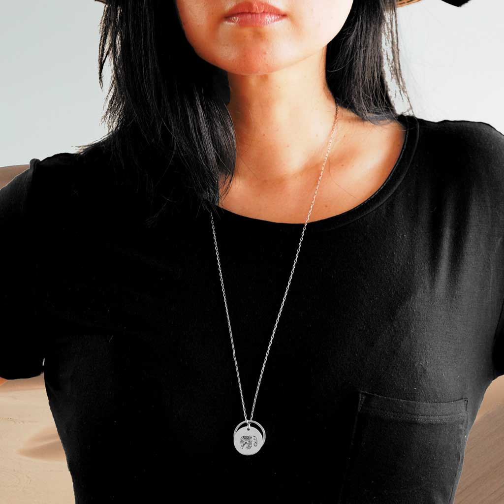 Model wearing Enchanted Elephant and Ring of Fire Rhodium long chain