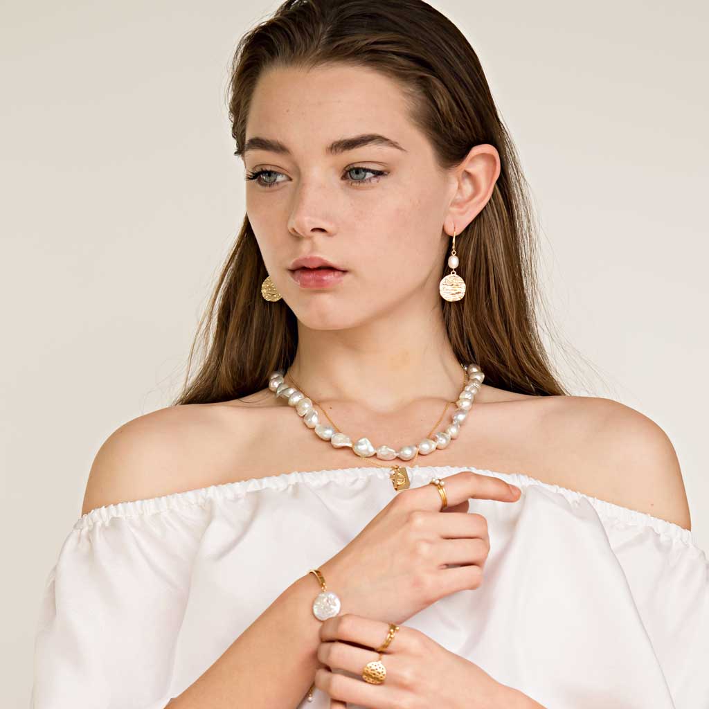 Model wearing Enchantment Pearl Bracelet and Necklace styled