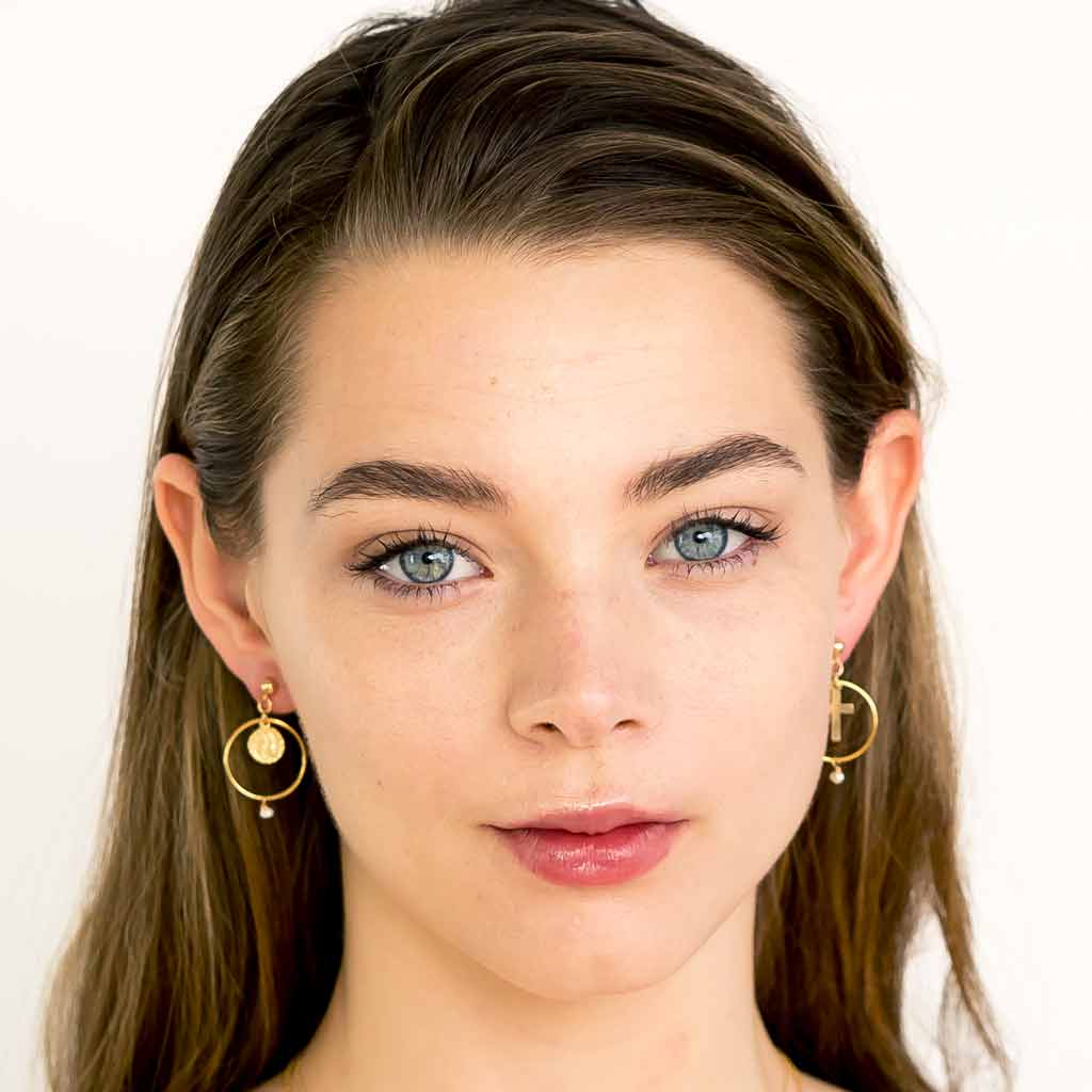 Model wearing Faith Union Earrings Gold closeup