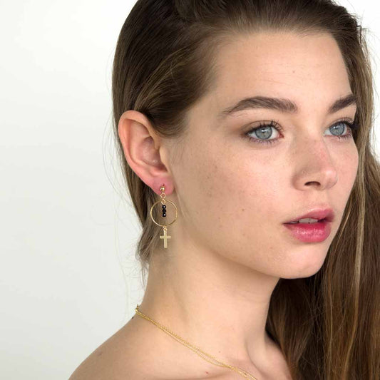 Model wearing Halo Faith Earrings Gold and Black Spinel