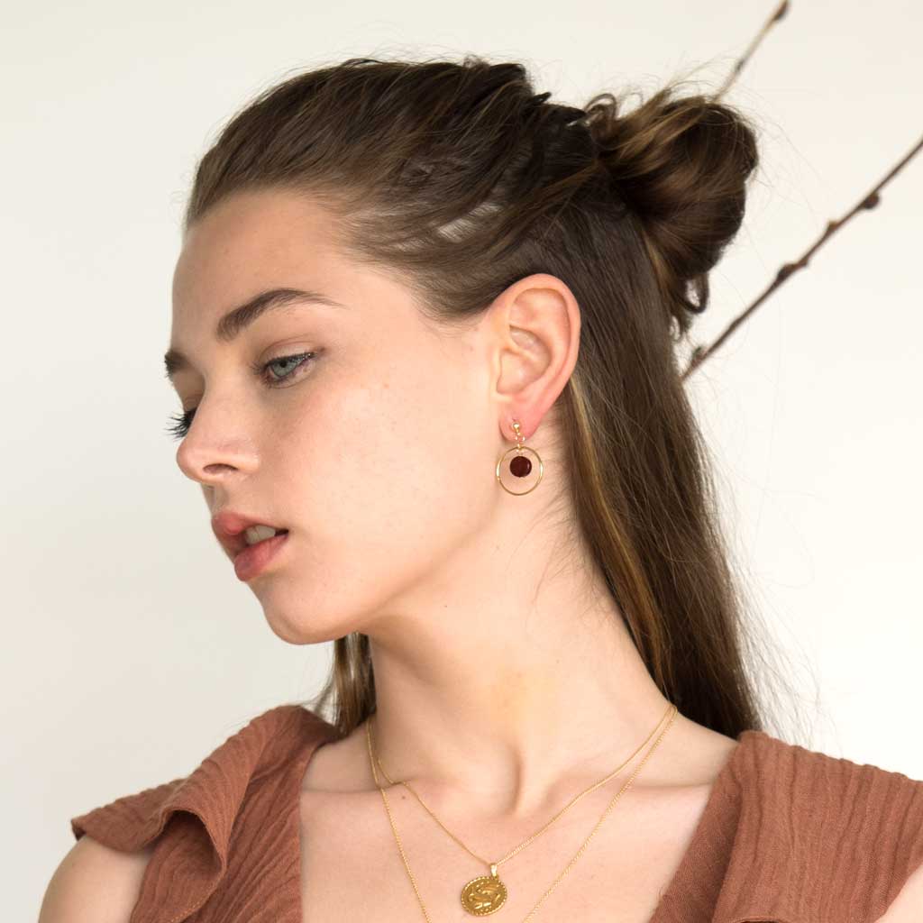Model-wearing-Halo-Sunrise-Earrings-and-Gold-pisces-necklace